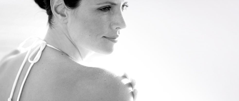 Woman looking over her shoulder